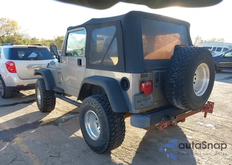 2002 Jeep Wrangler Sport z USA, uszkodzony, nr VIN 1J4FA49S12P717501